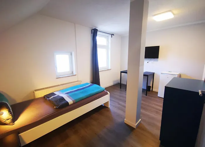 Apartament Mit 11 Einzelzimmern Sportcafe